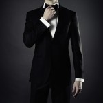 Photo of stylish man in elegant black suit